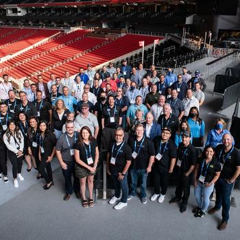 all winners stand inside Mercedes-Benz stadium overlooking the field